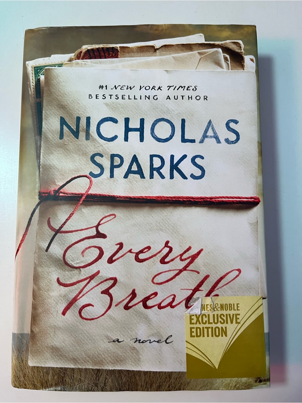 Nicholas Sparks Paperback Book Back Flap - Cream and Pink Text